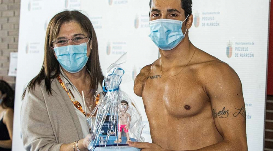 Quislant con el nadador Carlos Martínez